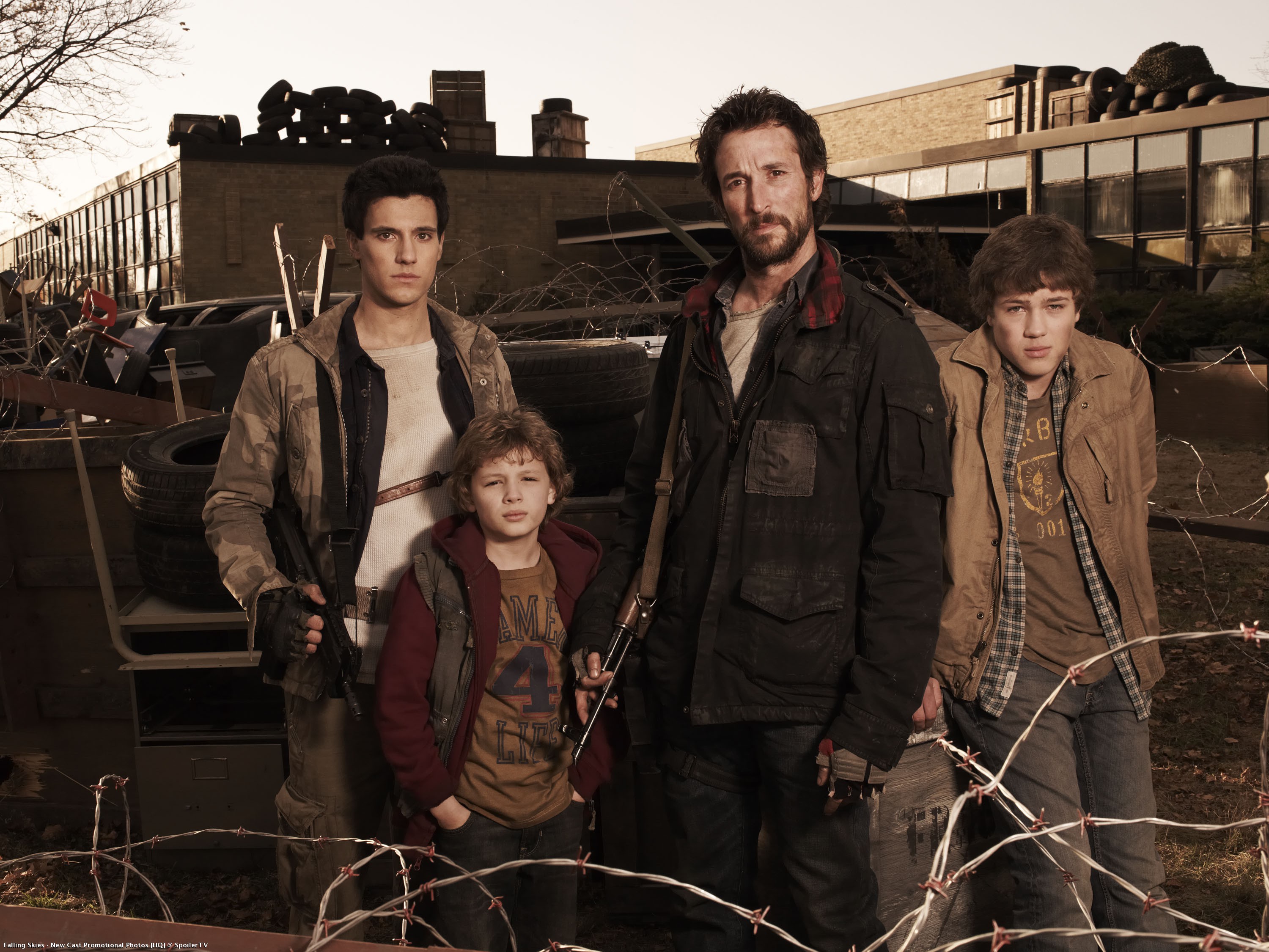 Promotional still from the TNT series 'Falling Skies'. From left to right: Drew Roy as Hal, Maxim Knight as Matt, Noah Wyle as Tom and Connor Jessup as Ben.