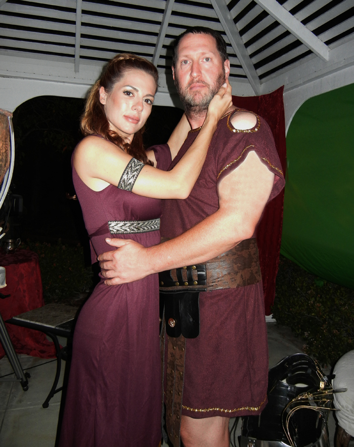 Brian Reed Garvin and Ava Brunini pose for a still during filming of Centurion AD.