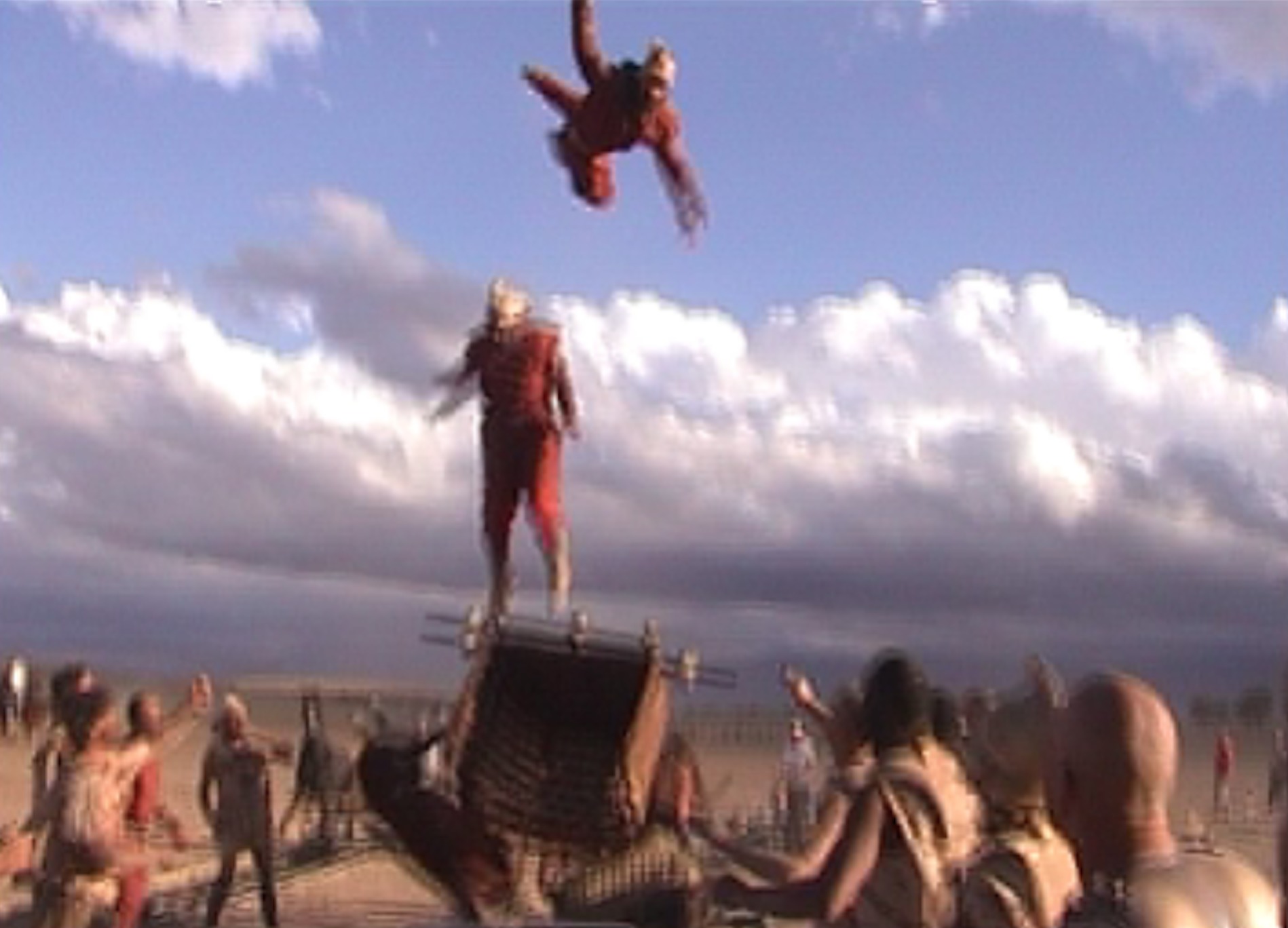 Sean (pictured top) and another stuntman (pictured bottom) flying from Chariot air ram on Oliver Stone's 