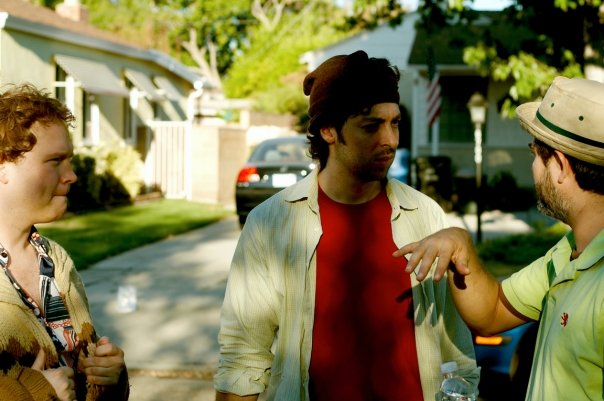 Timothy Dvorak and Jason Ball get direction from Jeffrey DeChausse on the set of 