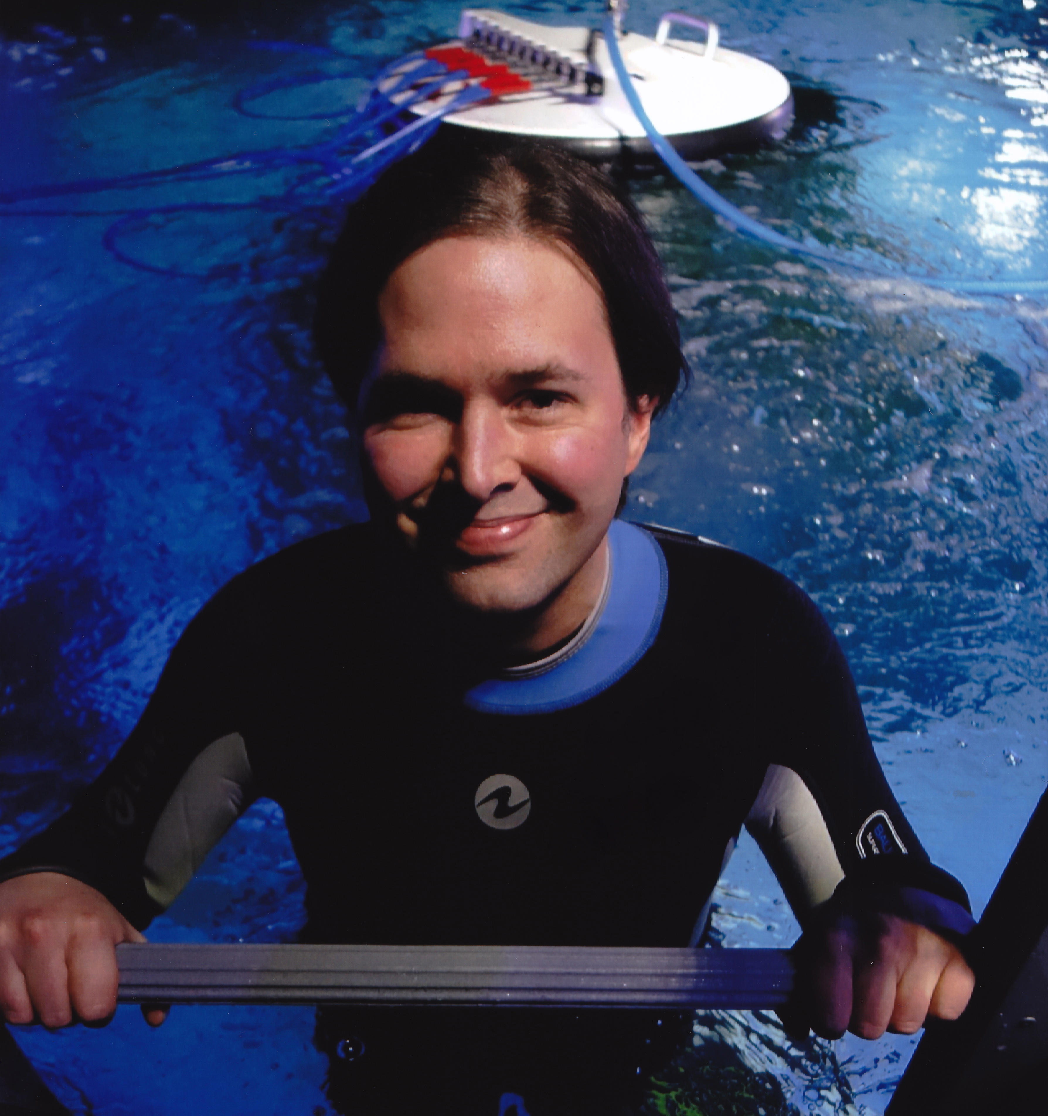 In the wetsuit, getting ready to go underwater.