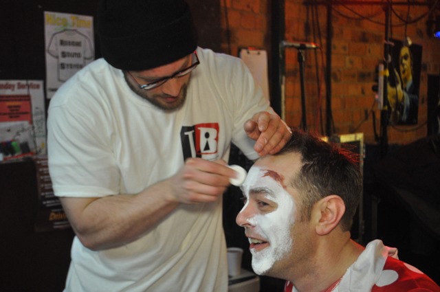 James 'JiB' Brown applying makeup to an actor for 'Gangster Poker Face' 2012