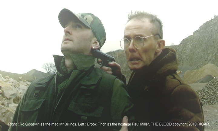 Right: Ro J Goodwin as the mad Mr Billings. Left: Brook Finch as the hostage Paul Miller. From the forthcoming feature THE BLOOD directed by Peter Montgomery