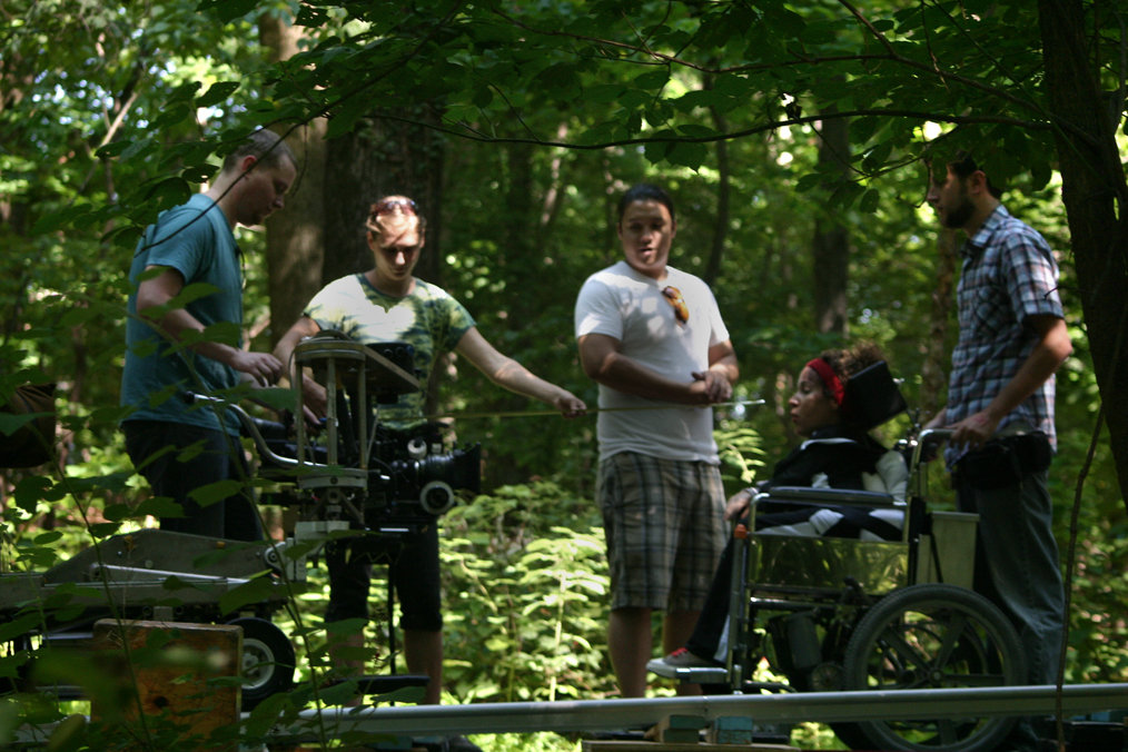 Director Jackie Julio talks with DP Jonathan Chen as crew prepares, in the award winning short film, 