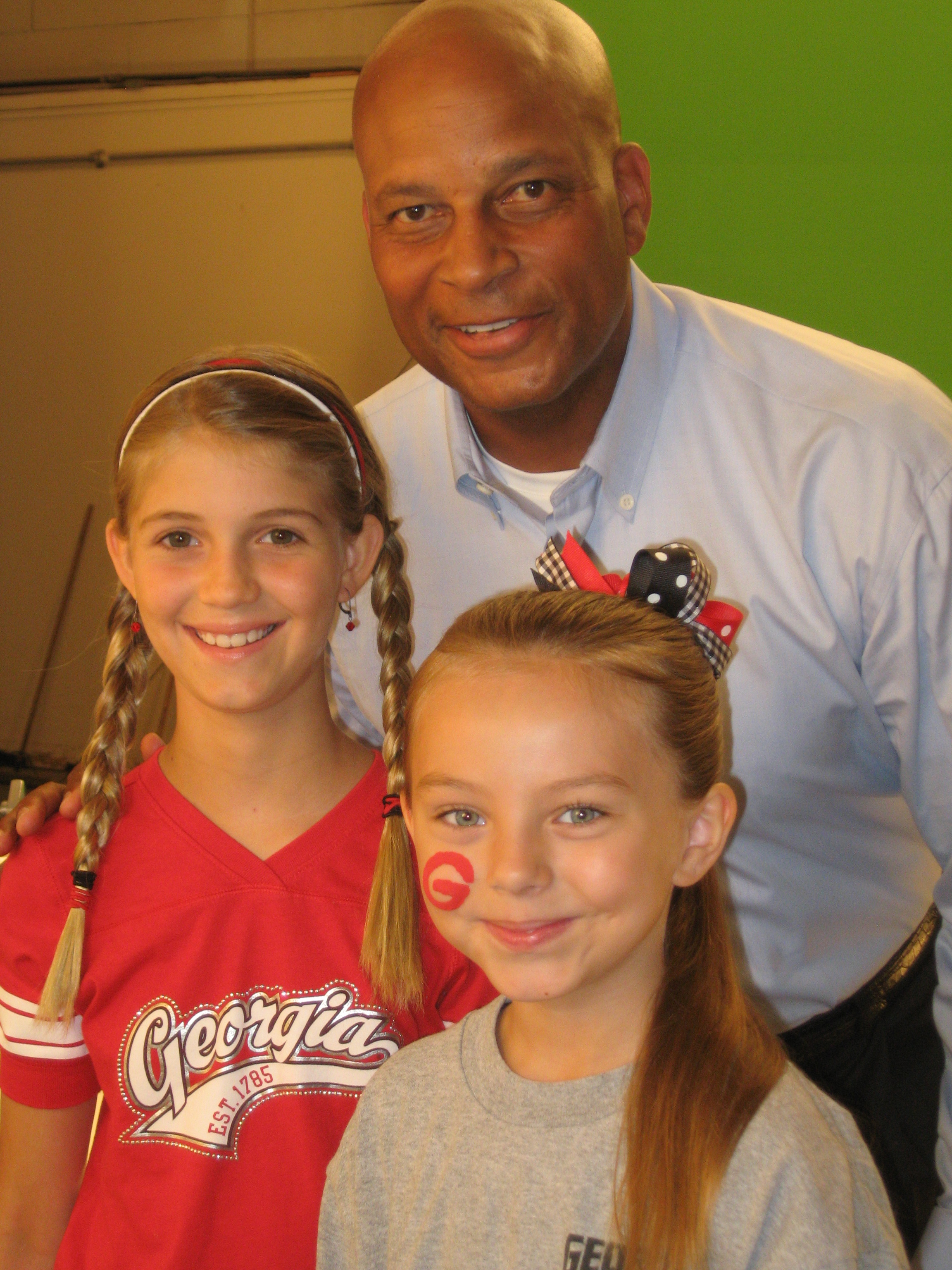 Caitlin Carmichael, Lexi, and football legend, Ronnie Lott, for EA Sports, June 2010