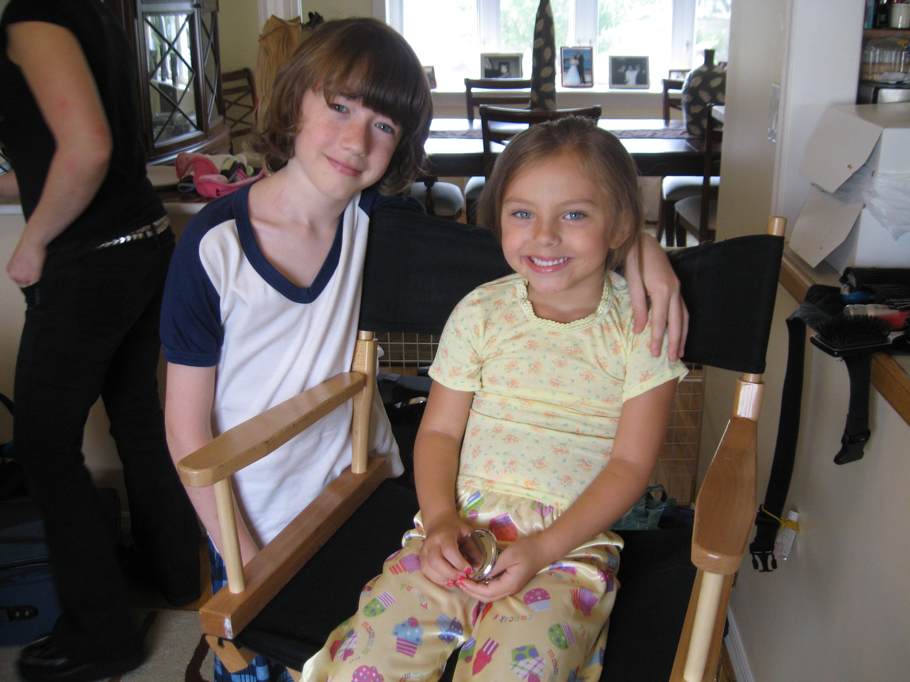 Actors Caitlin Carmichael and Chandler Frantz filming on set of feature film, 