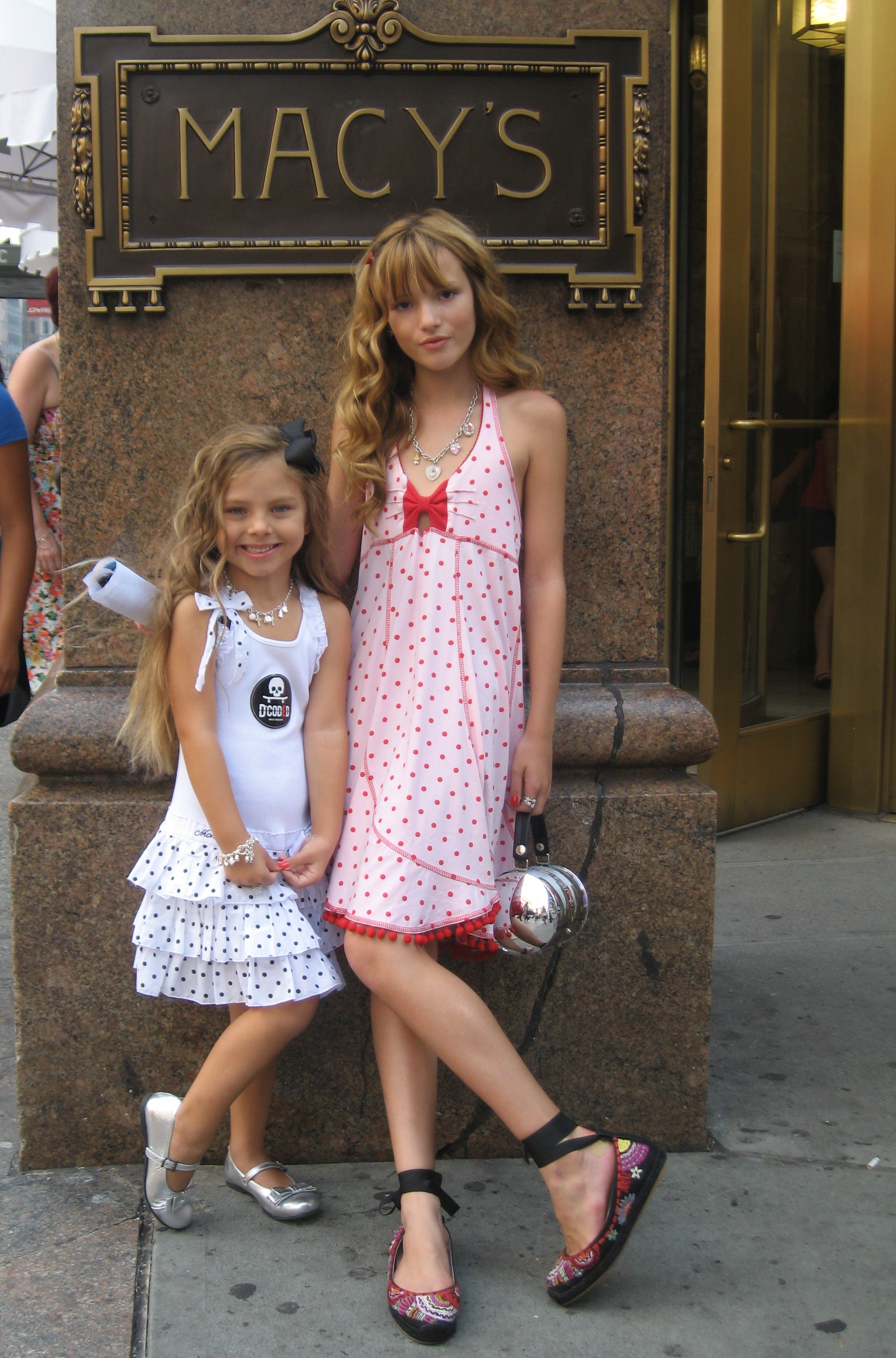 Actors Caitlin Carmichael and Bella Thorne pose for a photograph at the D*CODED Launch Event Featuring Taking Back Sunday at Macy's Herald Square Kids on 7 on August 16, 2009 in New York City.