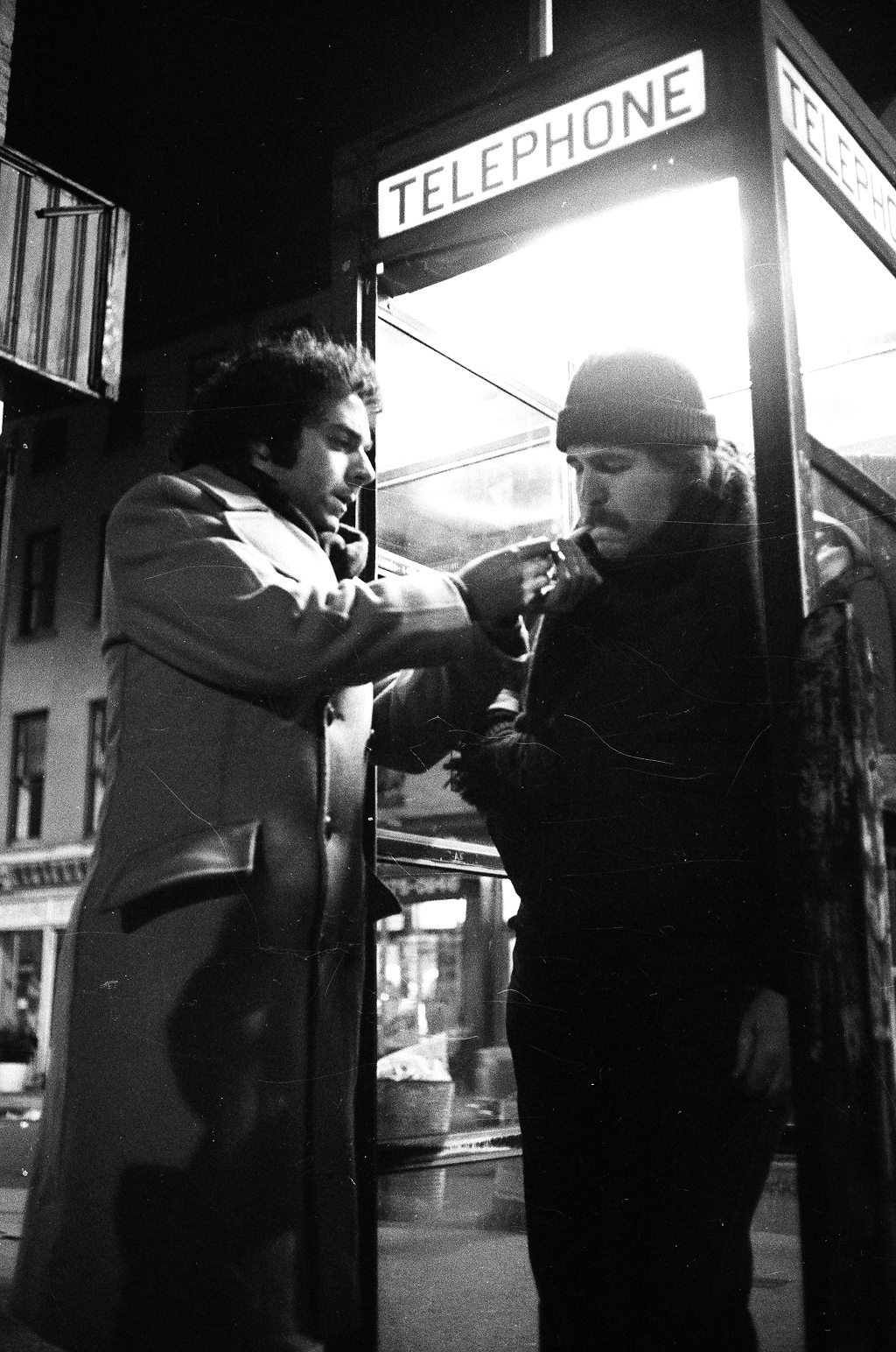 Actor Bob Murray lights a cigarette for Bill Reilly in Jeffrey Wisotsky's NYU student film, THE FORTUNE TELLER.