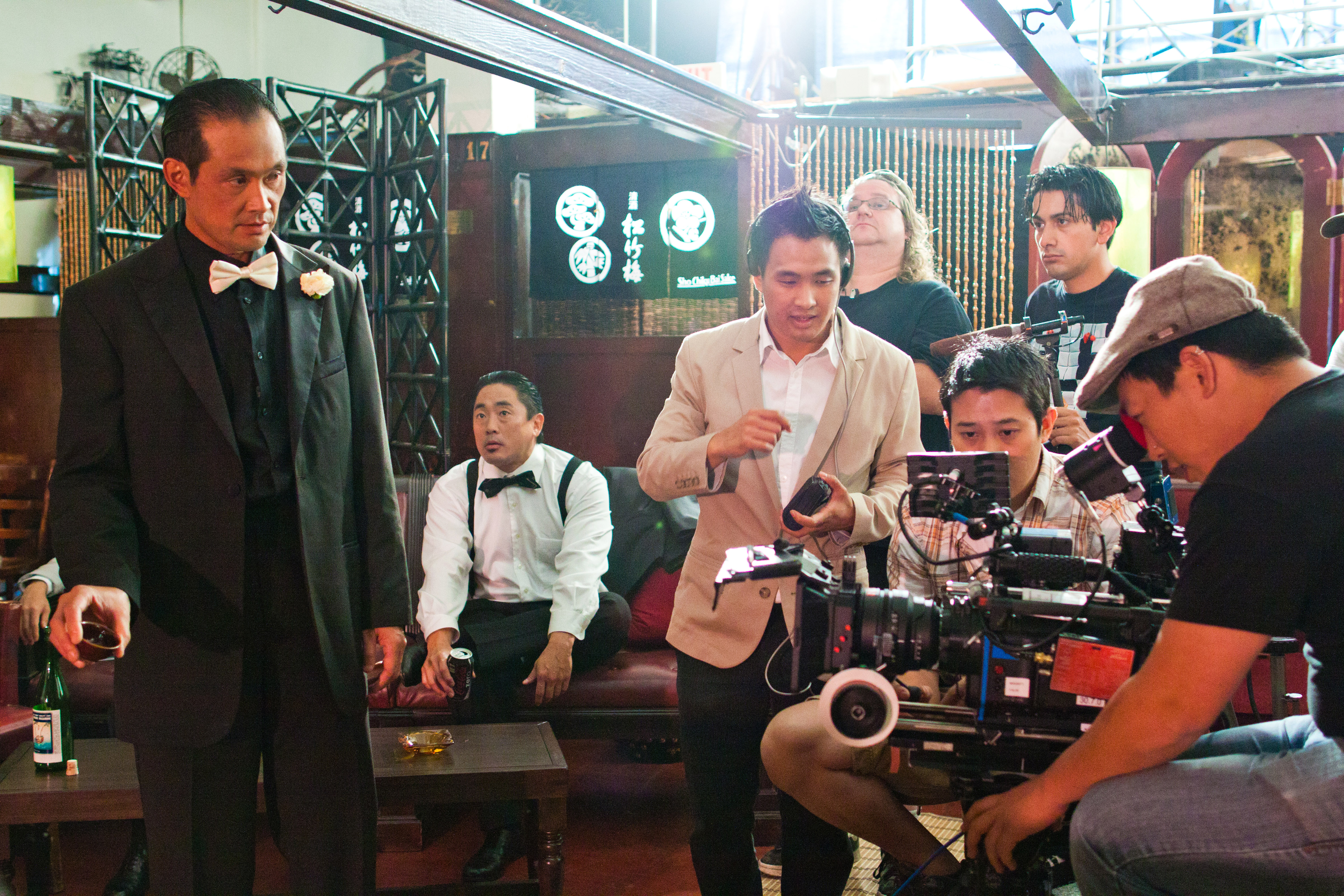 Director Jeffrey Gee Chin working with DP Ryo Miyamoto and actor Ikuma Ando on set of LIL TOKYO REPORTER