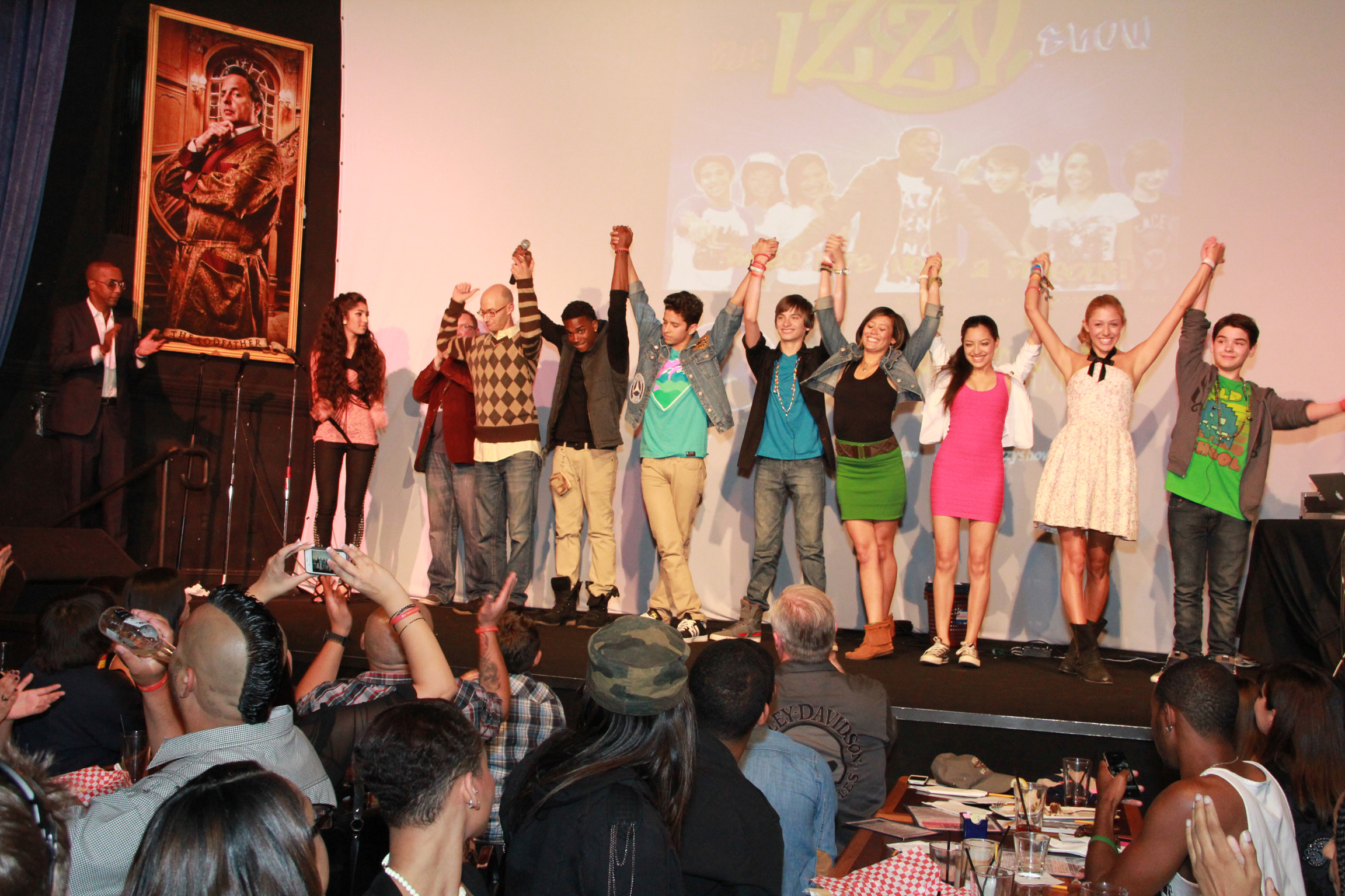 Andy Scott Harris and the cast of The Izzy Show take their bows at the Jon Lovitz Comedy Club at Universal City Walk