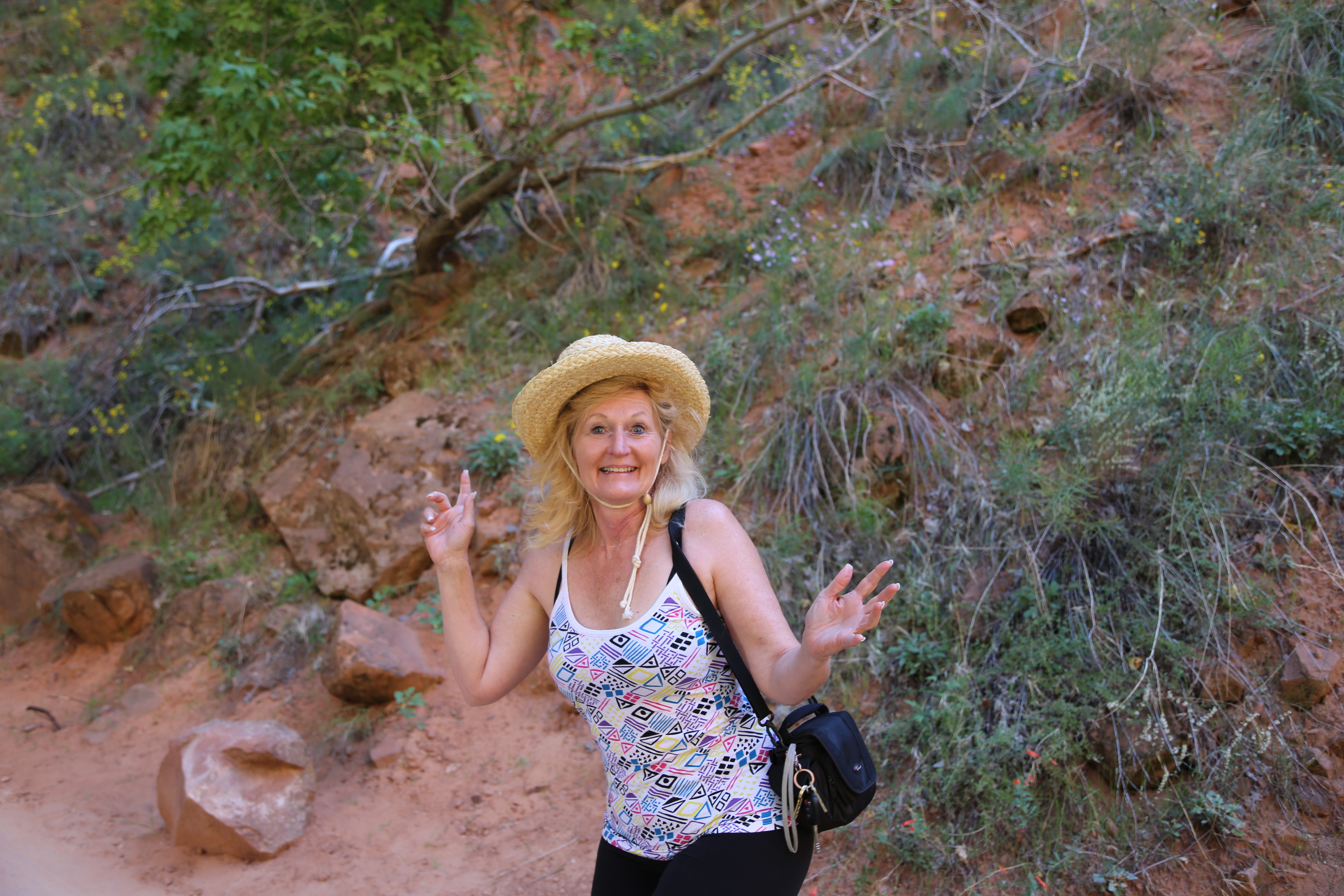 Blonde beauty funny posing in Zion National Park, UT