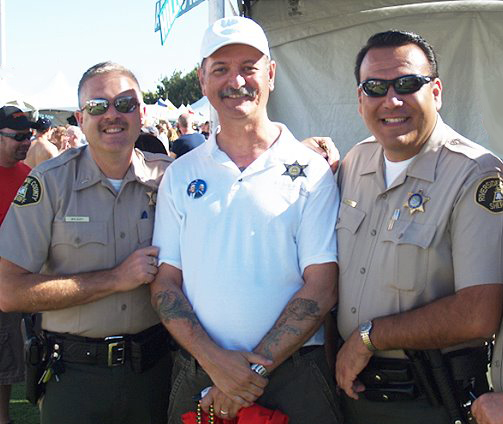 With members of the Riverside Sheriff Department.