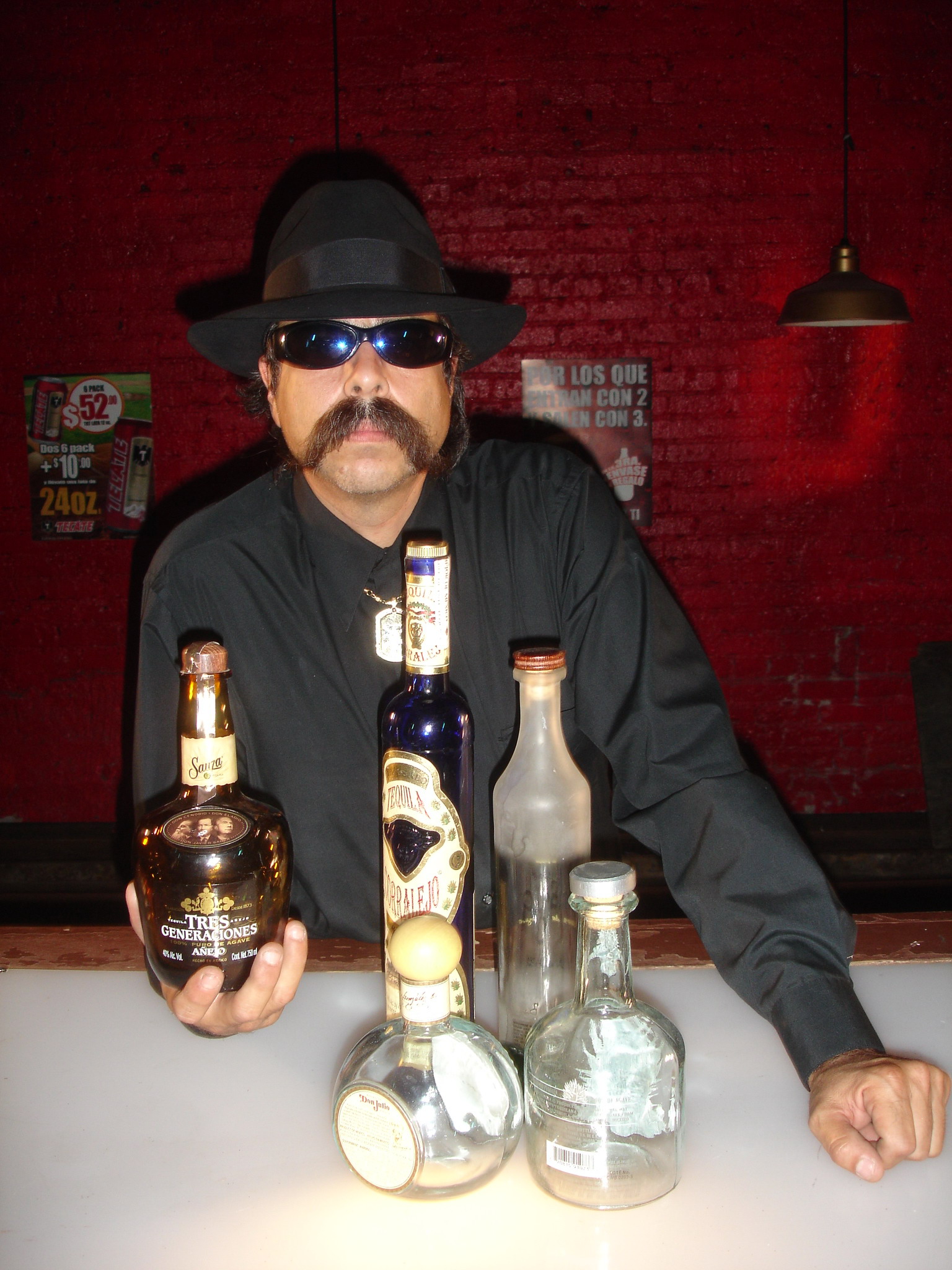 Miguel Corona as bartender in 