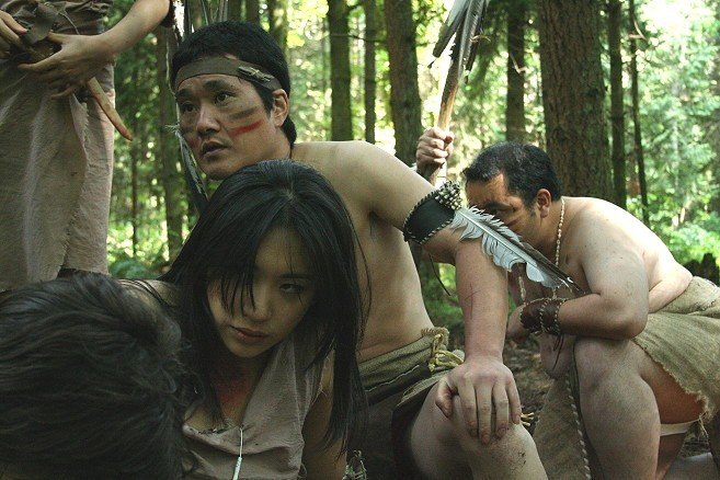 Facing the Bird Gods: the Kyontawa chief Shogoto (Taka Hiro) and his disheveled daughter, Princess Xionko (Beverly Wu).