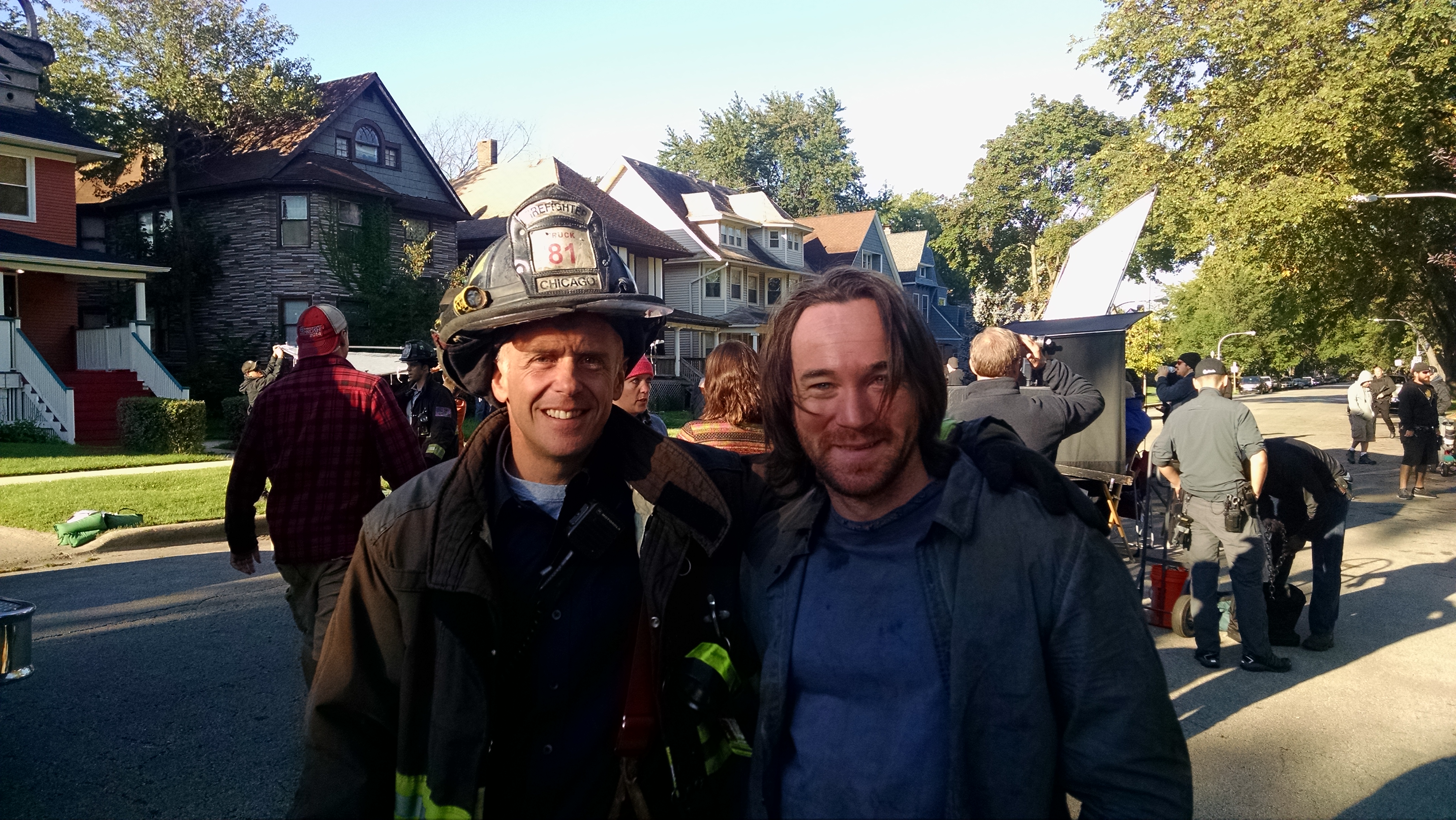 Ryan Carr and actor David Eigenberg on the set of Chicago Fire
