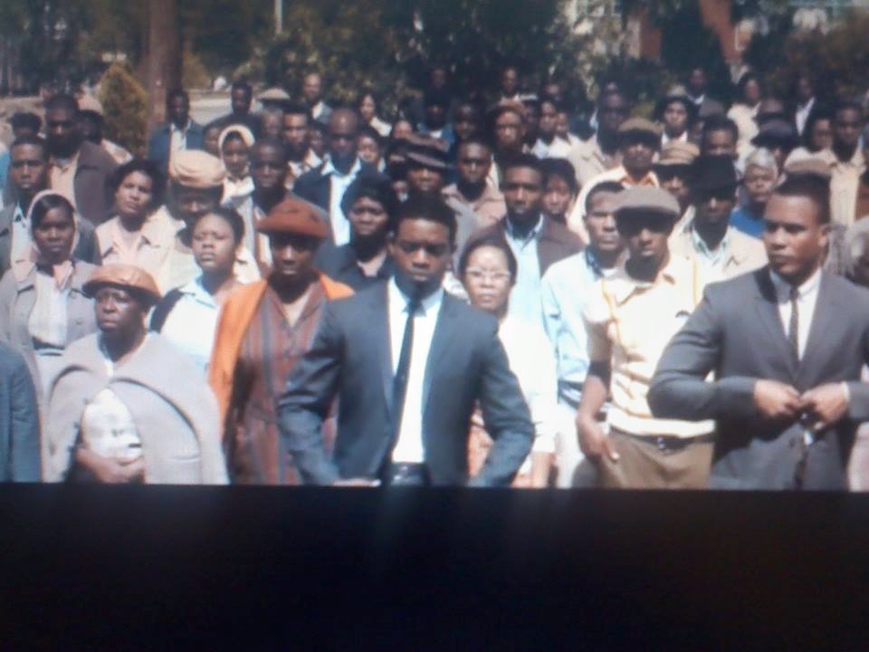 Still from SELMA (Standing far left - light-brown hat & gray sweater)