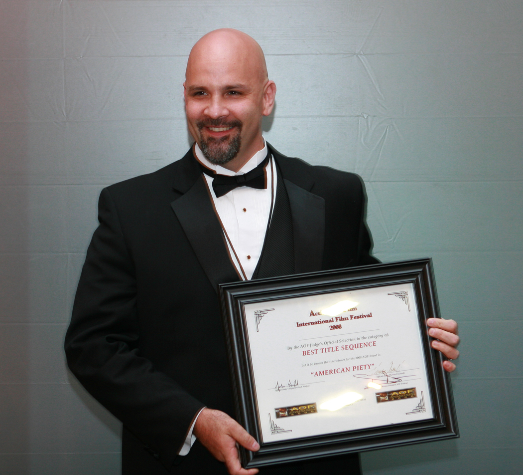 Steven Karageanes poses with his award at the 2008 Action on Film International Film Festival in Pasadena, CA.