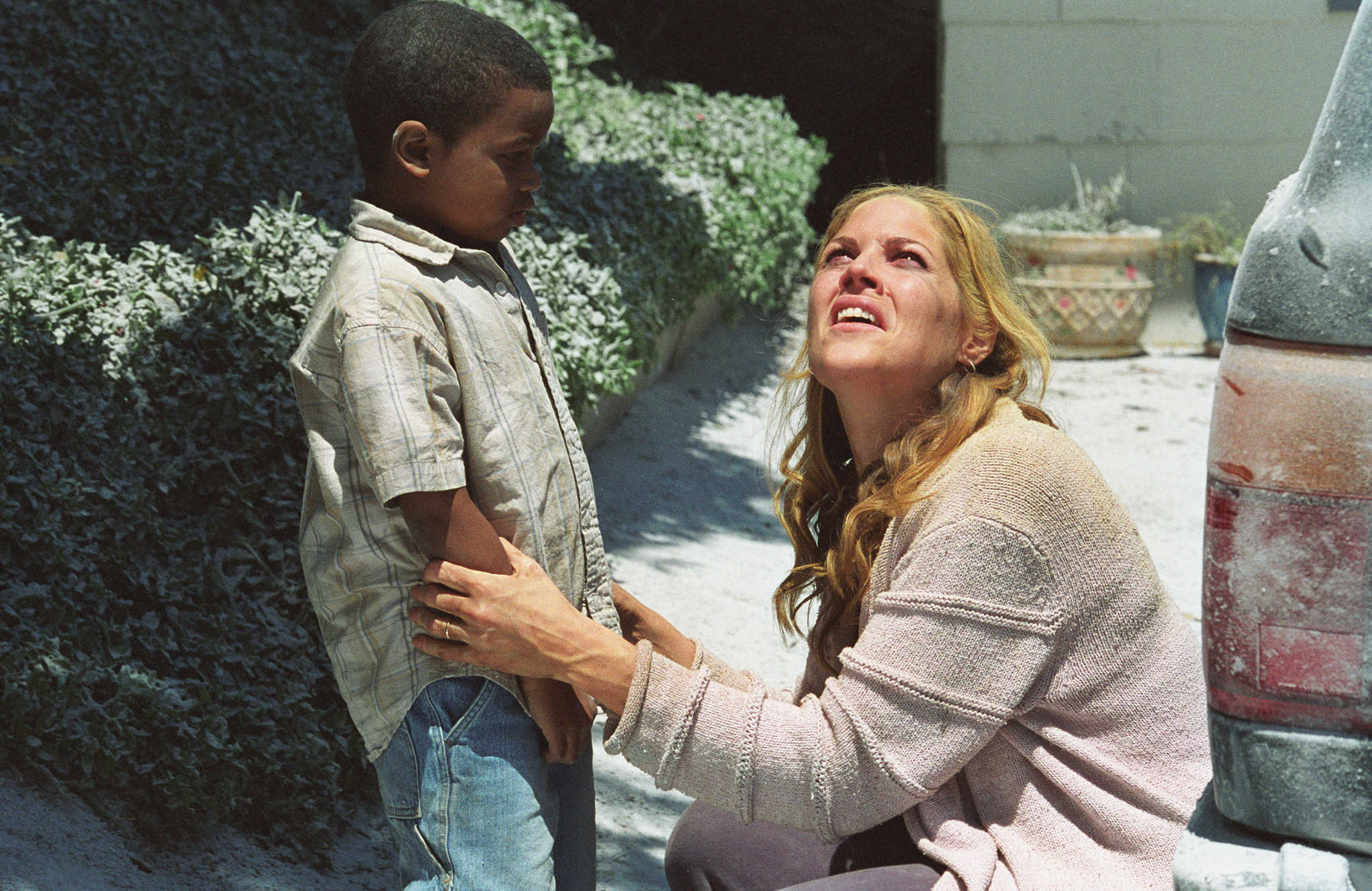 Still of Mary McCormack and Scotty Noyd Jr. in Right at Your Door (2006)
