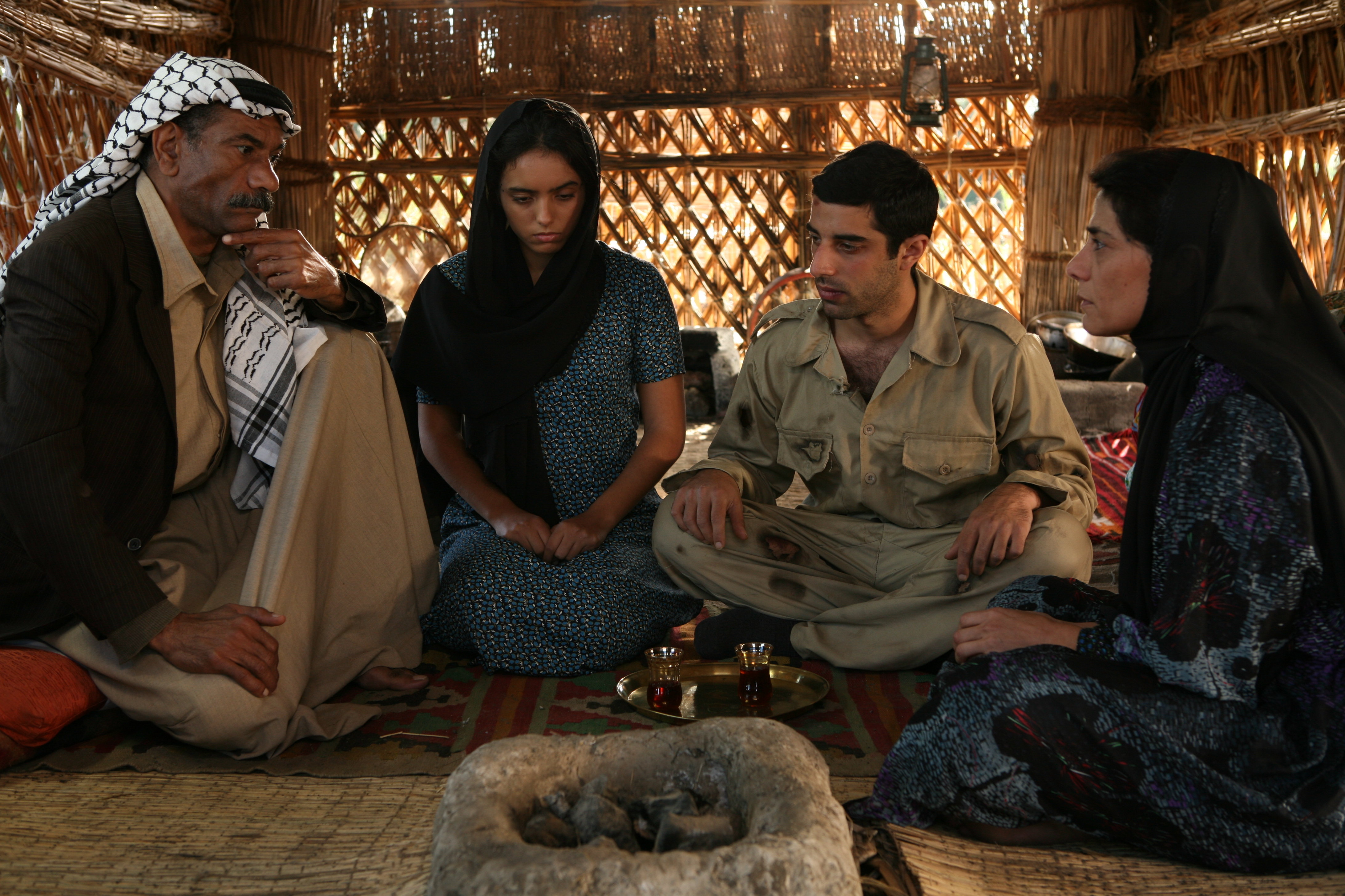 Hiam Abbass, Karim Saleh, Hafsia Herzi and Sayed Ragab in L'aube du monde (2008)