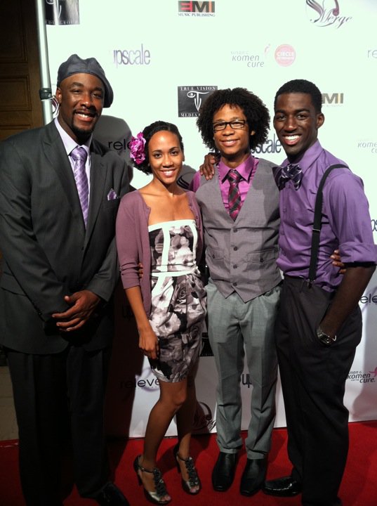 Elesia Marie with co-stars Dominic Wall, Christian Broussard, and Kelvin Welbeck