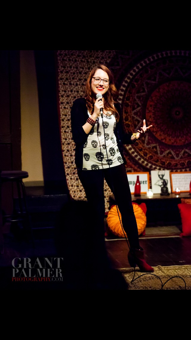 Performing stand up at an evening celebrating female artists.