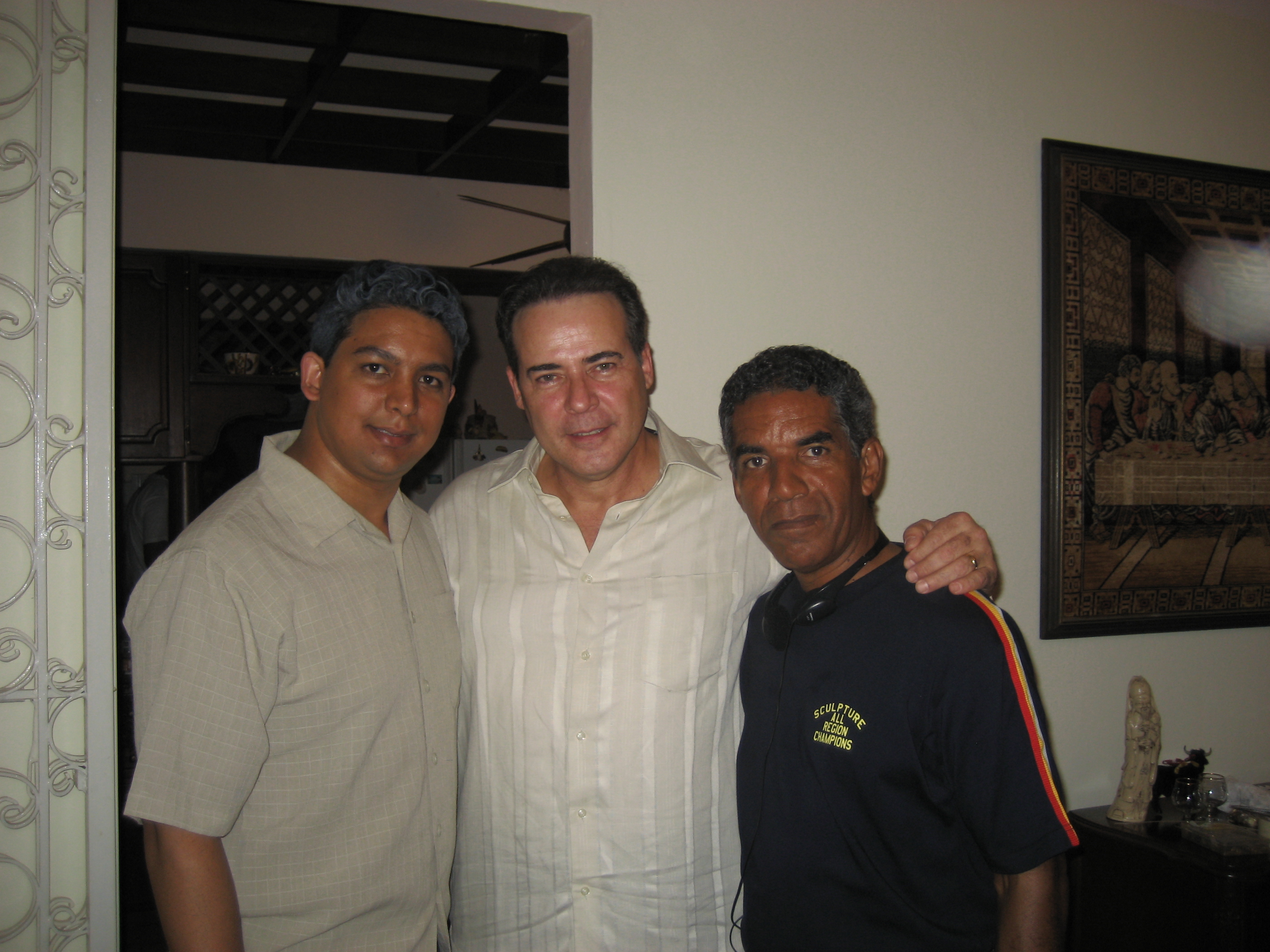 Ed Garcia as Salvador E. Sadhala, Mexican Star Cesar Evora as Antonio de la Maza with Writer & Director Juan Delancer, on set 