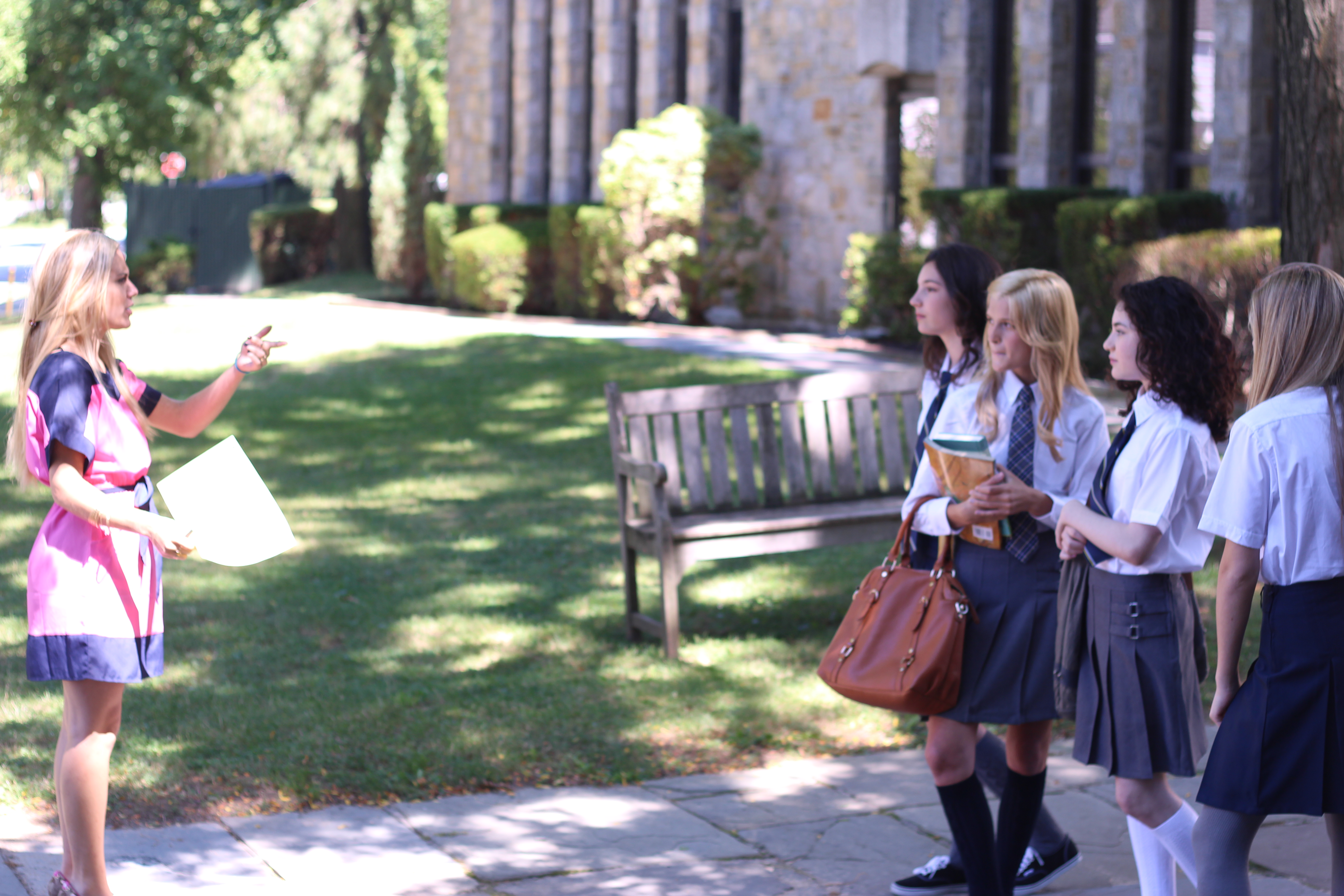 Marlee Roberts directing Eden Wright, Charlie Swan, Lilla Crawford, and Isabella Palmieri on set of 