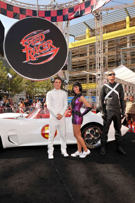 Colton Haynes and Sarah Hummert pose at the Speed Racer premiere in Los Angeles.