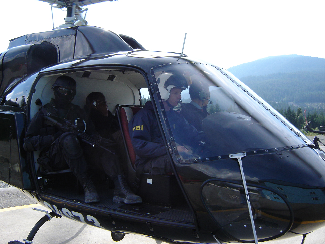 Steve Gray flying FBI picture helicopter on the set of 