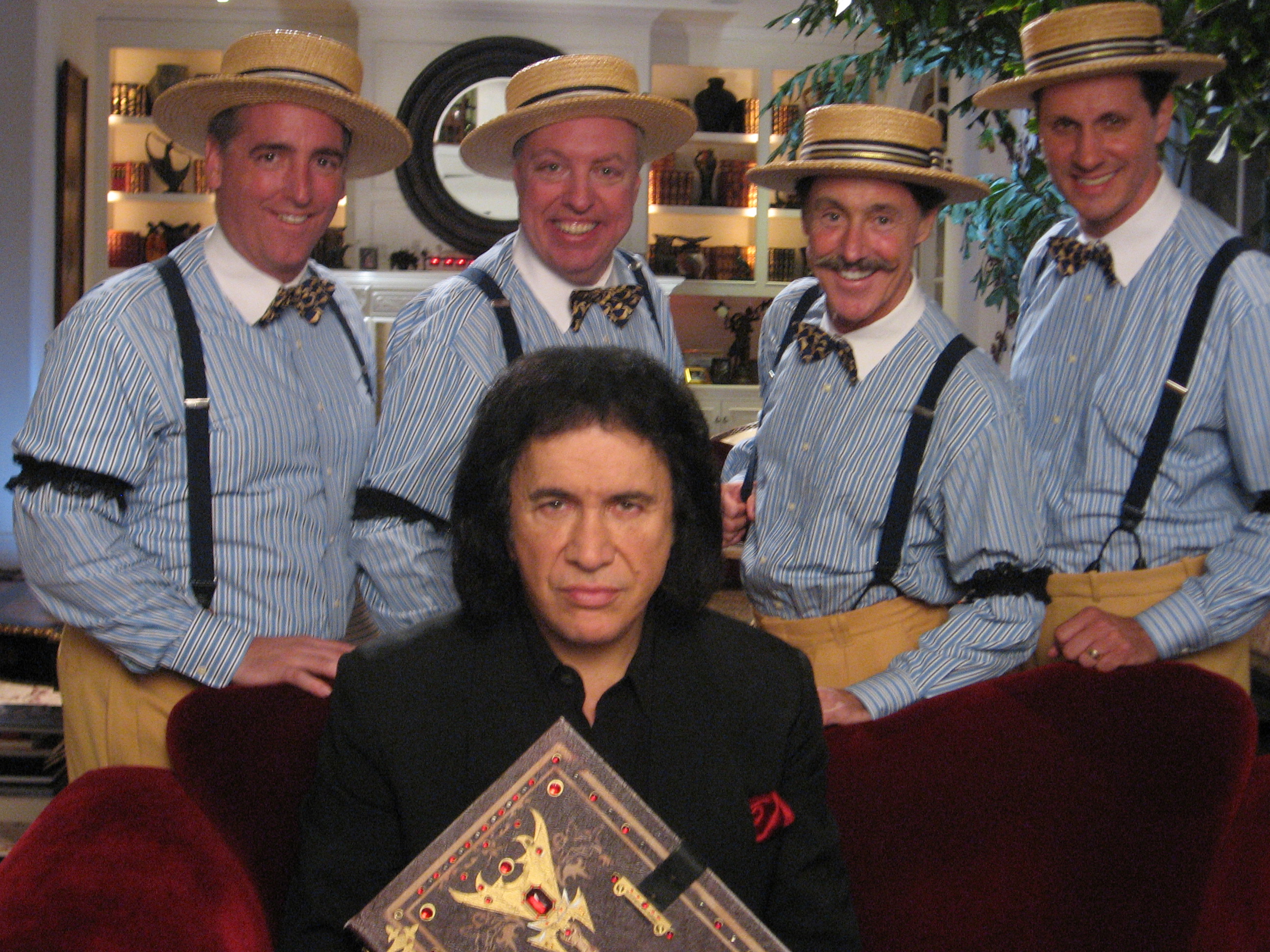 The Perfect Gentlemen (Phil Gold, Dan Jordan, Tim Reeder, and Jim Campbell) sing behind Gene Simmons on 