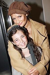 Maddie Levy as Young Cosette with Lea Michele as Epione in Les Miserables at the Hollywood Bowl (2008).