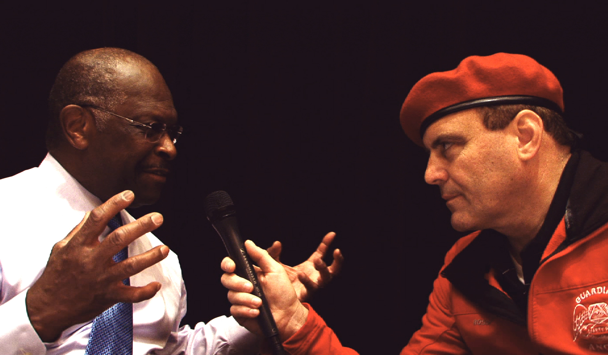Still of Curtis Sliwa and Herman Cain in Évocateur: The Morton Downey Jr. Movie (2012)