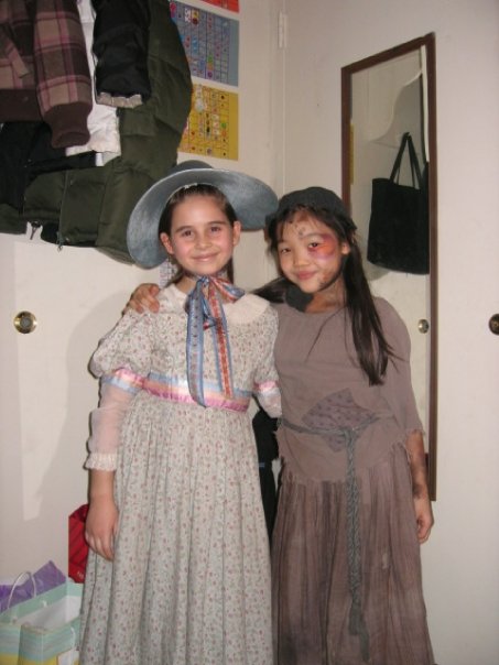 Kylie as Little Cosette (Carly Rose Sonenclar as little Eponine) in the Broadway Revival of Les Miserables at the Broadhurst Theater.