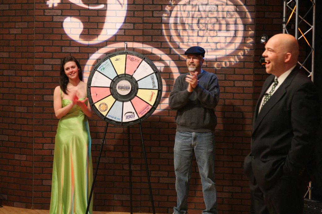 Tim Kavanagh and guest winning a spin on the prize wheel with the lovely Miss Jen-Jen