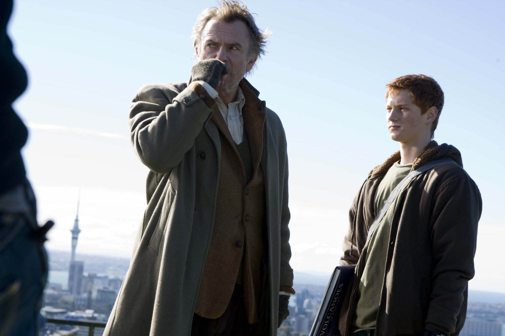 Still of Sam Neill and Tom Cameron in Under the Mountain (2009)
