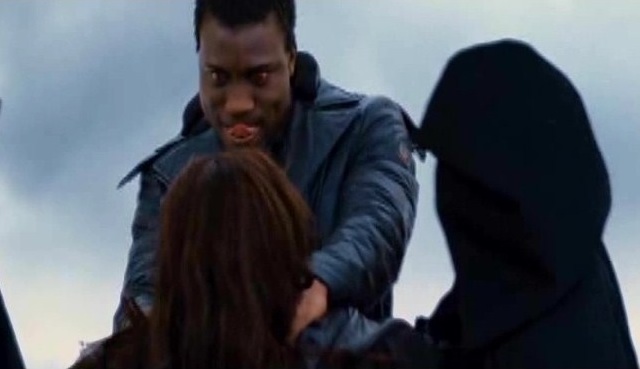 Amadou Ly (Henri) attacks Kristen Stewart (Bella) in Alice's vision in Breaking Dawn Part 2