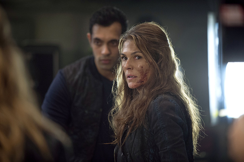 Still of Paige Turco and Sachin Sahel in The 100 (2014)