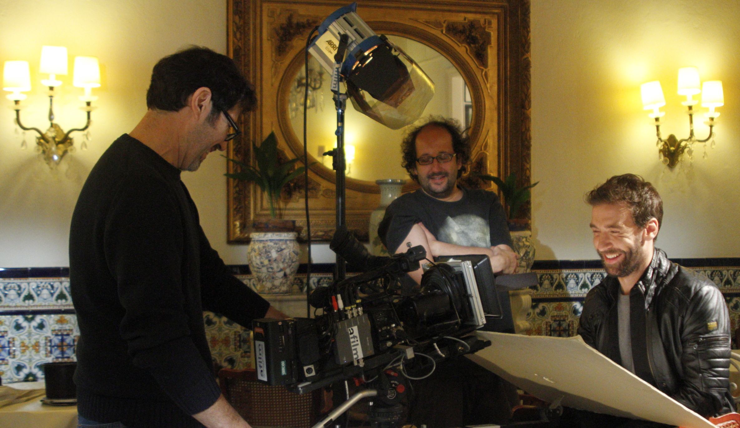 Pedro Caxade with director Joan Alvarez and DOP Juan Fernandez on Leaving Hotel Romantic set.