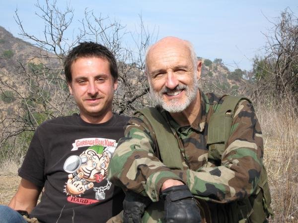 Gregory Paul Smith & Michael Gross on the set of '100 Million BC'.