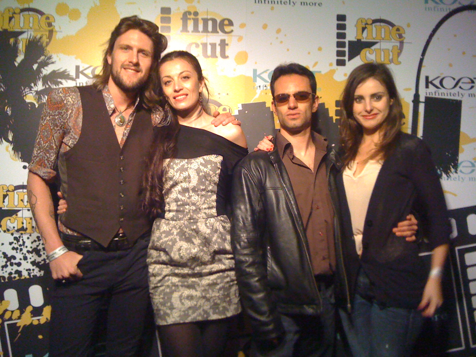 Maximilian Law with Claire-Louise Sedgley and Laura Cotenescu at a Los Angeles red carpet premiere.