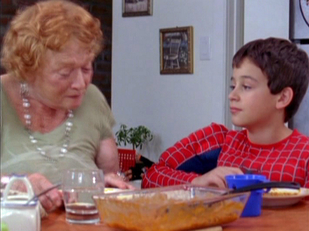 Character John and Grandma. They discover that John is in love with a girl and Grandma is in love with the neighbor.