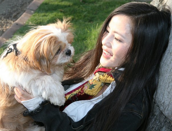 actress Nina Xining Zuo with her shih-Tzu puppy.