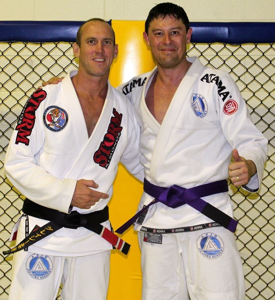 Receiving my purple belt in Jiujutsu from Professor Jason Roebig, Axis Jiuiitsu Australia.