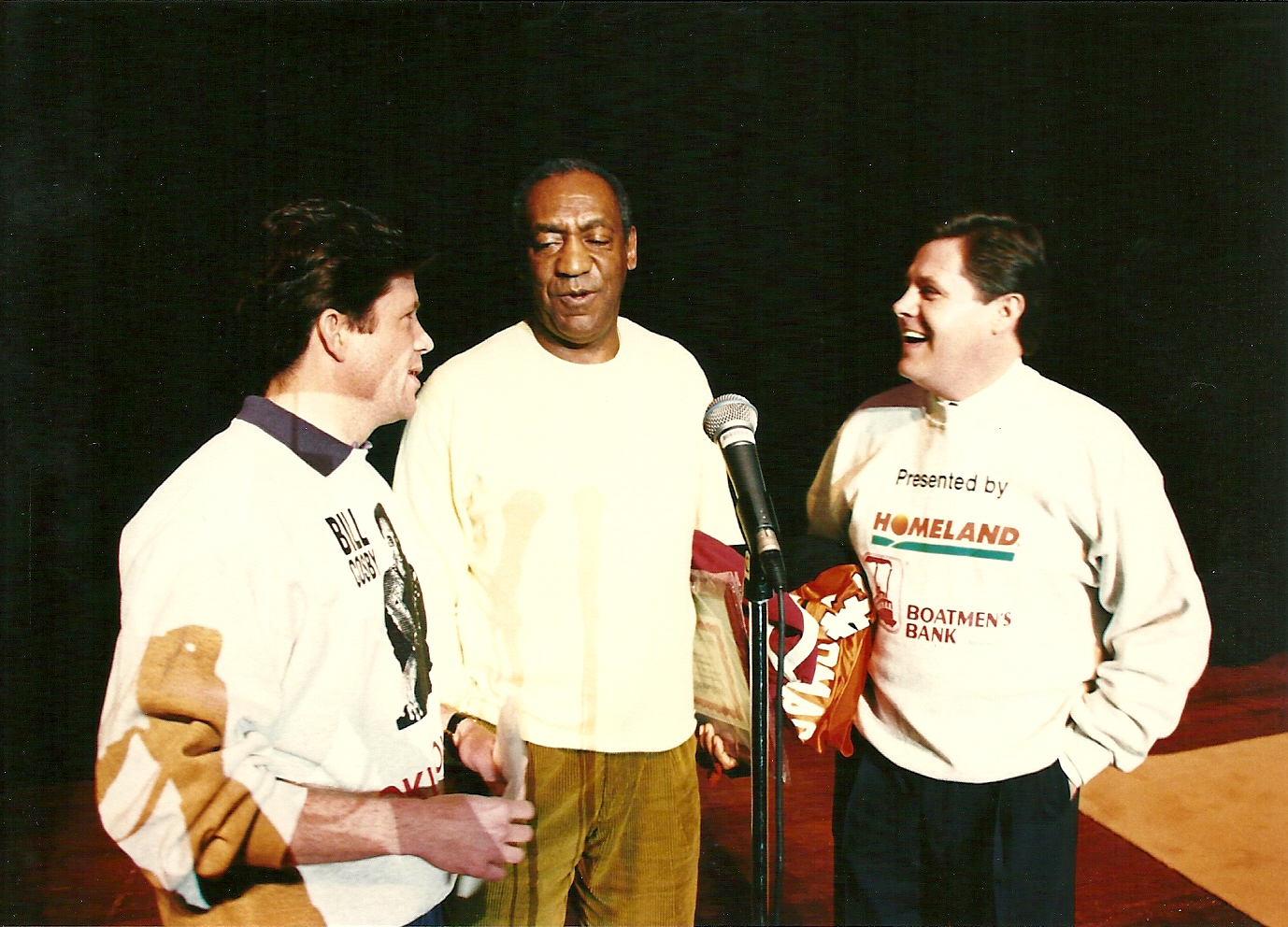 Ben McCain and Butch McCain on stage with Bill Cosby in Oklahoma City.