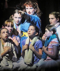 (pink striped shirt lower right) As Julie Hope in Billy Elliot on Broadway