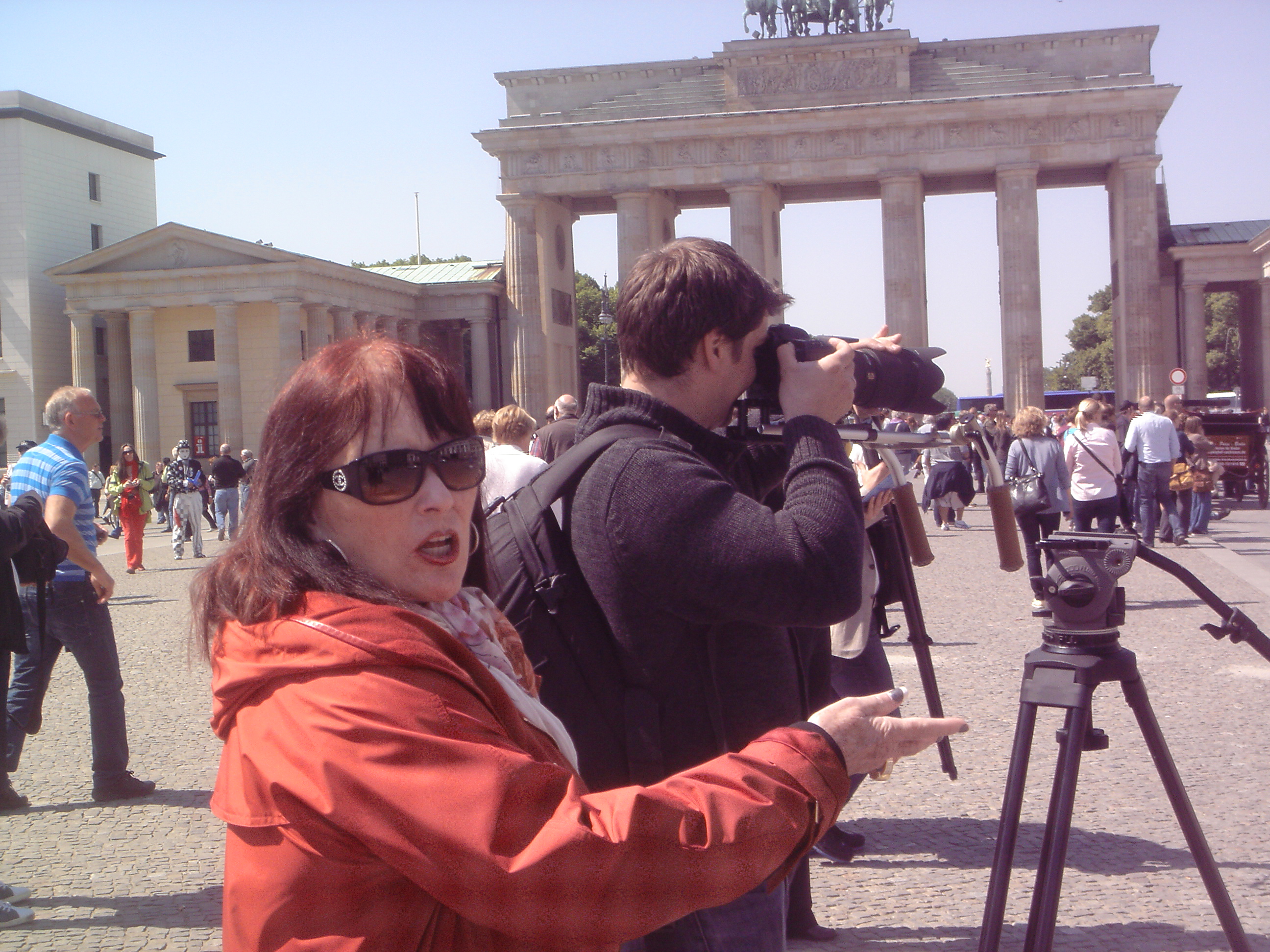 Joanna M. Champlin directs a hand-held shot in Berlin