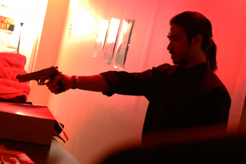 Behind the scenes shot of The Hitman (played by Tyce Francois)from the feature 