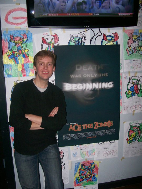ACE The Zombie: wrap party next to movie poster using my face