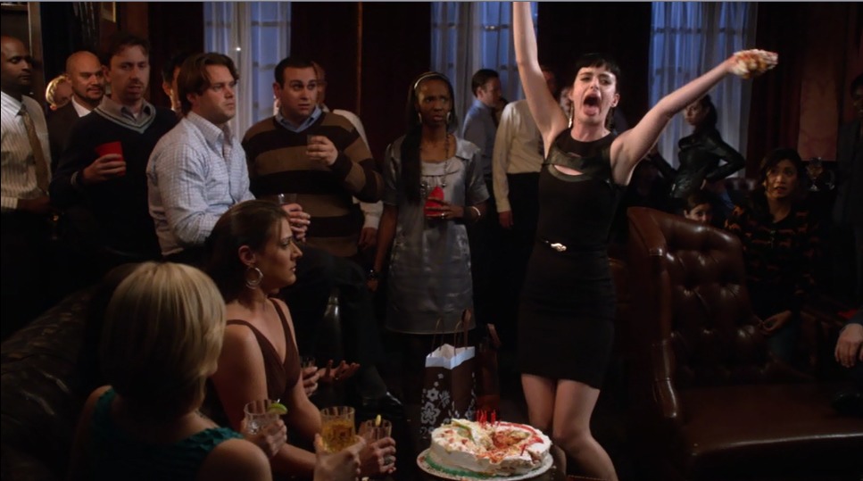 Mark Sinacori on Don't Trust The B- In Apartment 23 as a Birthday Party Guest to the left of Krysten Ritter in a brown striped sweater in the episode 