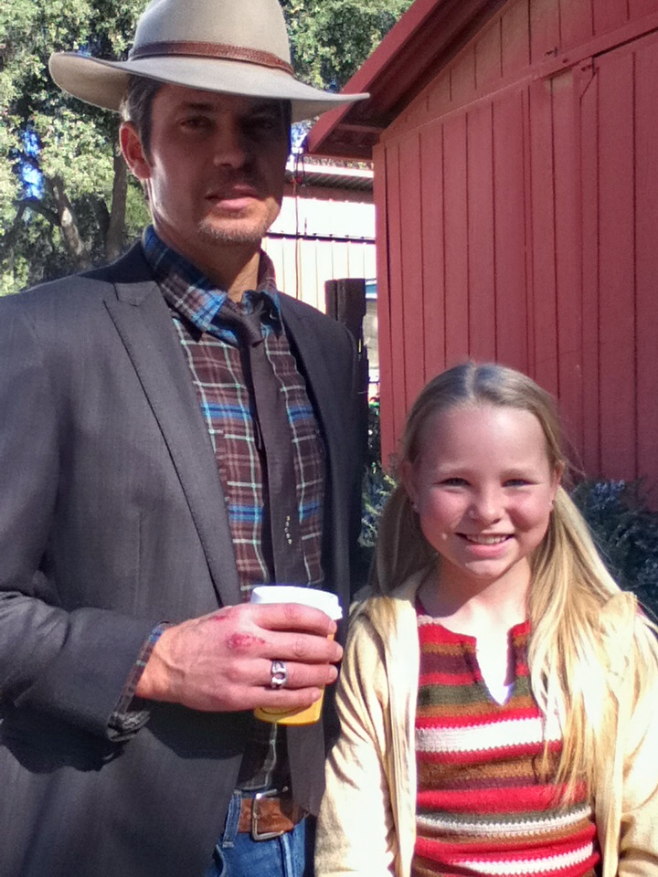 Amber with Timothy Olyphant on set of 